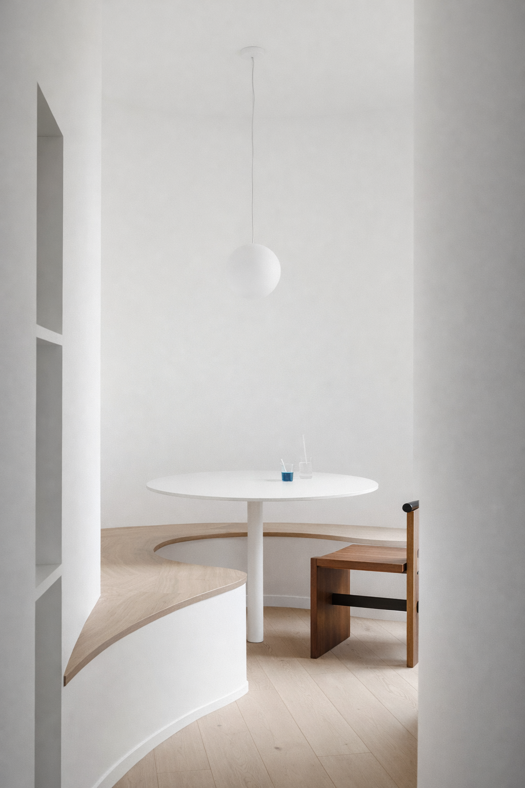 Minimalist dining nook with wooden accents